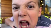 caucasian-little-boy-making-faces[1].webp