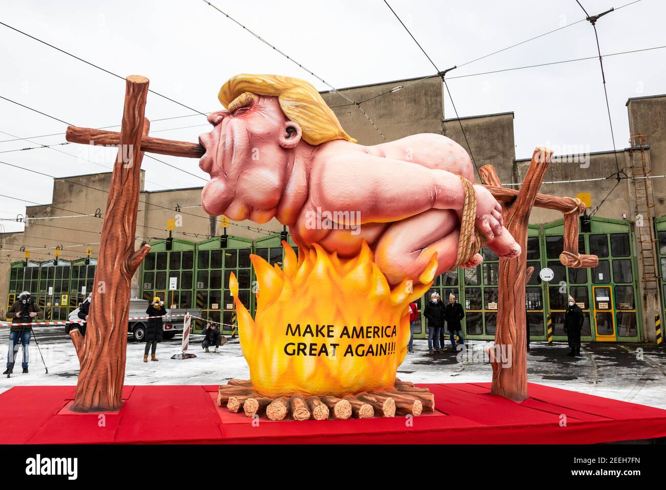 donald-trump-on-a-spit-roast-making-fun-of-his-motto-maga-make-america-great-again-carnival-floats-created-by-german-artist-jacques-tilly-were-presented-and-later-exhibited-throughout-dusseldorf-as-the-main-carnival-parade-was-cancelled-due-to-the-coronavirus-pandemic-2EEH7FN.jpg